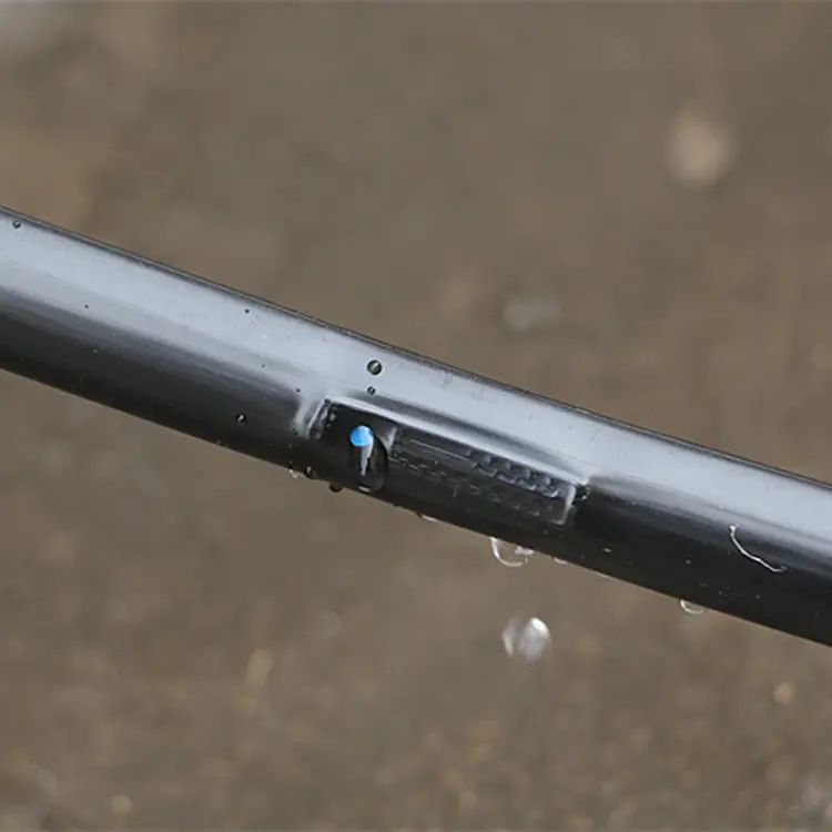 Indlagt emitter dryp irrigationsbånd